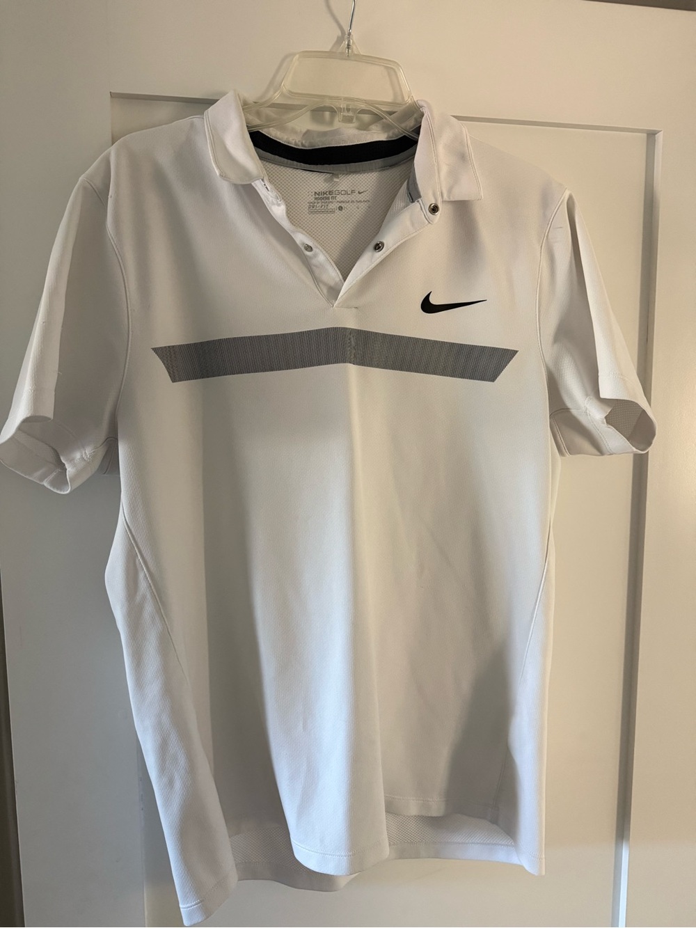 Nike White Polo Shirt with Gray Chest Stripe and Black Swoosh